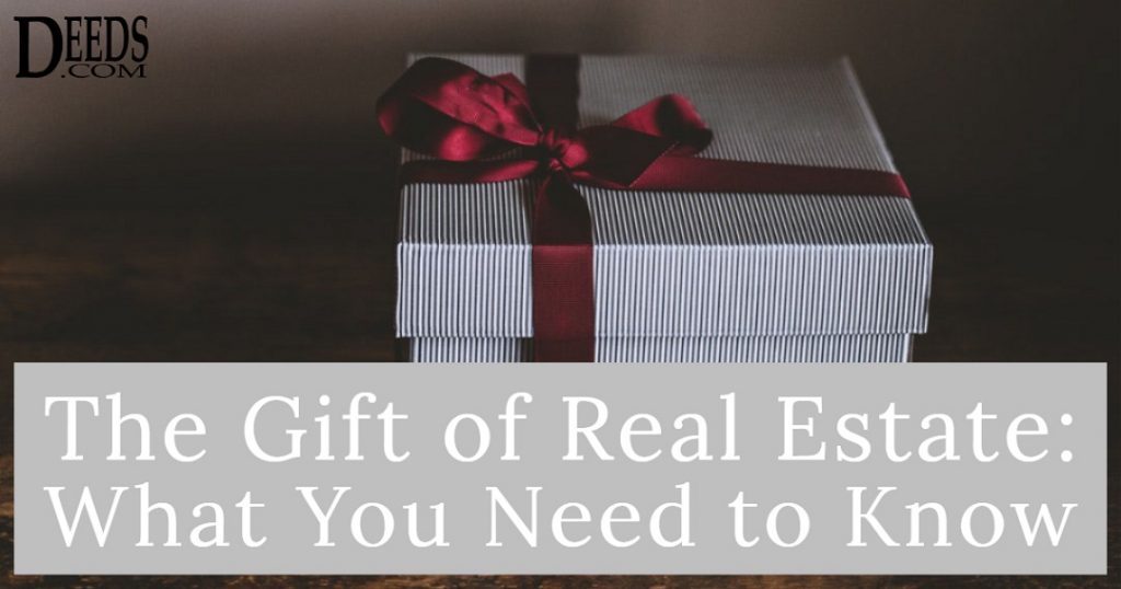 Image of a gift box with a red bow. Captioned: The Gift of Real Estate, What You Need to Know.