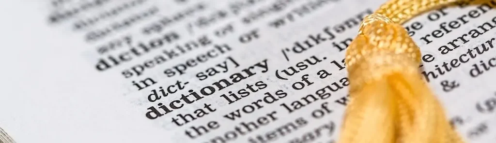 Image of a page out of a dictionary. Captioned: What Does That Mean? A Guide to Real Estate Lingo.