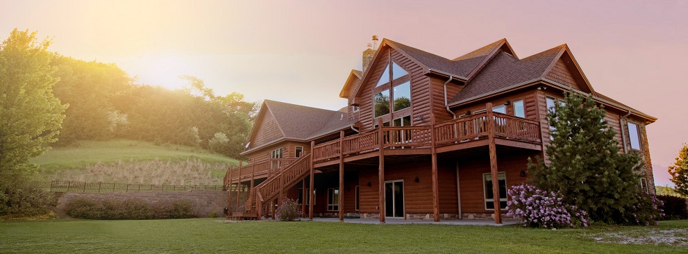 Image of a nice country house during a sunrise. Captioned: Home Sellers Capital Gains Tax 101