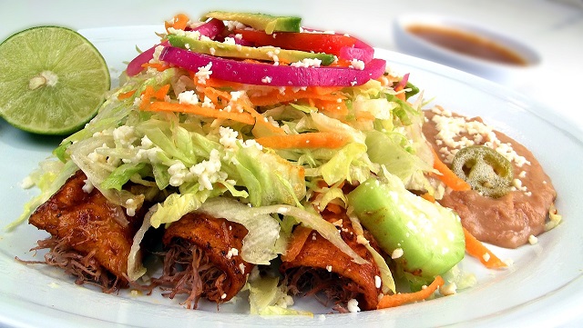 Image of enchiladas on a plate.