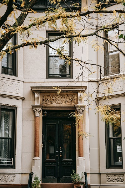 The front of an old, historic looking building.