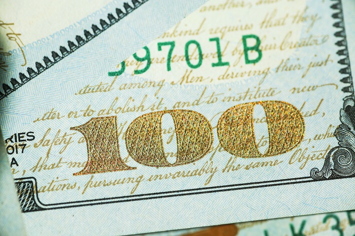 Image of the corner of a one hundred dollar bill, U.S. currency. Captioned: Washington State Deed Recording Fees Just Went Up.