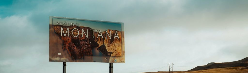 Image of the welcome to Montana sign. Captioned: Montana Property Taxes