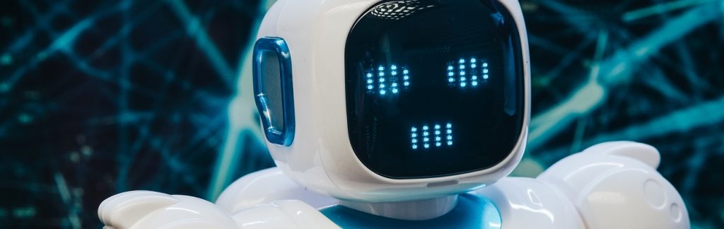 Image of a toy robot face with a digital background.