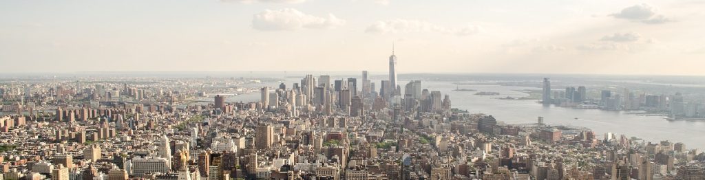 Panoramic view of a large city with high-rise office space being converted to residential housing.