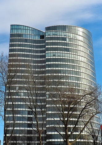 Image of the outside of a high-rise building being converted to residential housing.