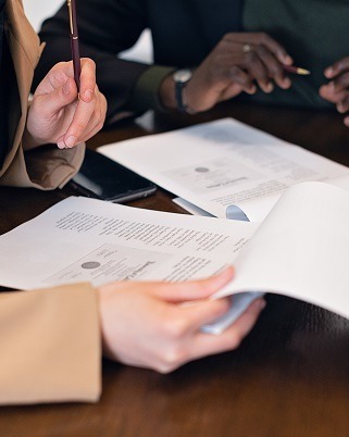 People reviewing legal documents.