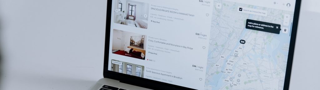 Image of a computer screen showing real estate rental listings on a map.