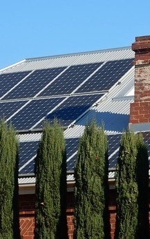 image of the roof of a house with solar panels on it