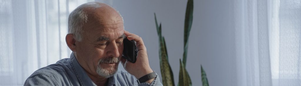 Person talking on the phone about their hardship affidavit